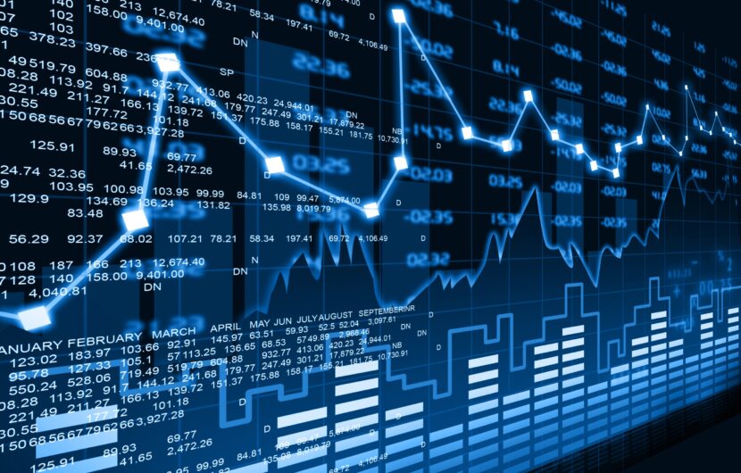 A financial graph with fluctuating lines and bar charts is displayed over a background of numerical data and dates. The image is predominantly blue, symbolizing market analysis and stock trends.