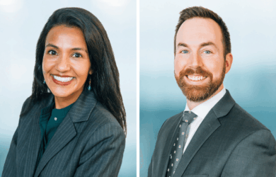 Two professionals in formal attire are smiling, each in separate portraits. The woman on the left has long dark hair and wears a striped suit. The man on the right has short hair and a beard, wearing a suit and polka dot tie. Blue background.