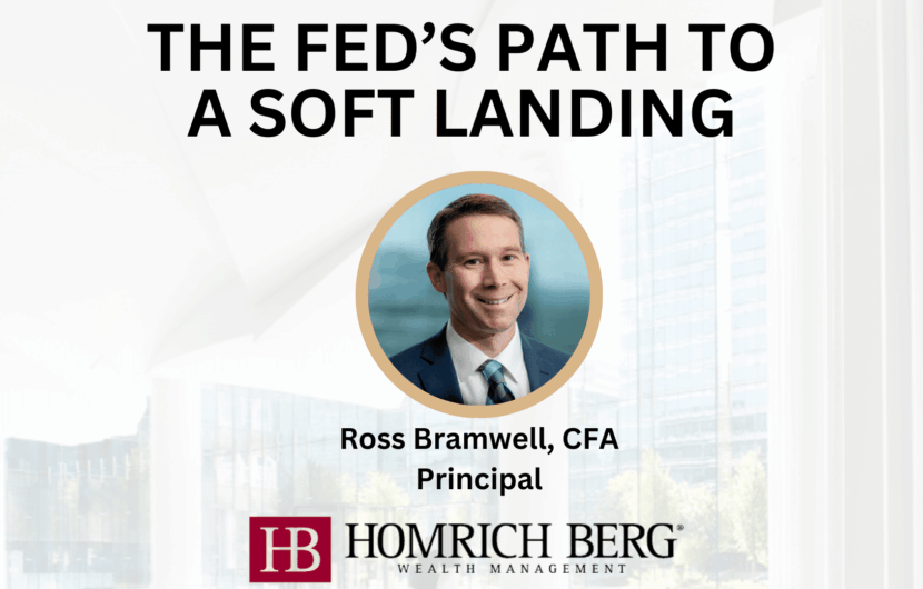 A business presentation slide titled The Feds Path to a Soft Landing featuring a headshot of Ross Bramwell, CFA, Principal. Below is the Homrich Berg Wealth Management logo. The background shows a blurred office setting.