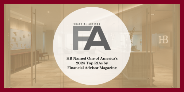 A modern office interior with glass walls is visible. Text on the image reads, HB Named One of Americas 2024 Top RIAs by Financial Advisor Magazine, with the initials FA prominently displayed in the center.