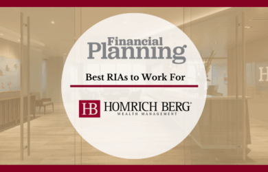 Image of an office with a glass door displaying a recognition badge. The text says Financial Planning: Best RIAs to Work For, Homrich Berg Wealth Management. The background shows a modern office interior.