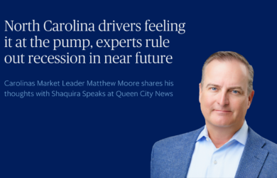A man in a blue jacket and light blue shirt stands in front of a blue background with text about North Carolina drivers, recession concerns, and an interview on Queen City News.